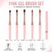 Set of five pink gel nail brushes with angled, flat, rounded, pointed and tapered tips, rose gold ferrules and protective caps.
