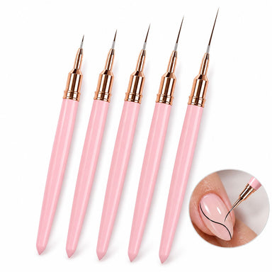 Five pink ultra-fine nail liner brushes with rose gold ferrules, shown painting a curved black line on a nude pink nail.