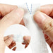 White nail protection sticker roll being torn for manicure and nail art protection, NSI Australia