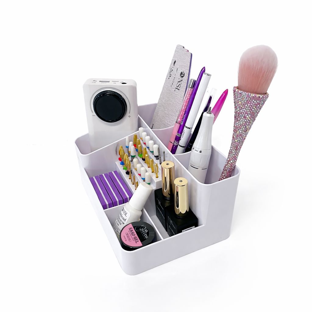 Nail tech desk organiser with multi-compartment storage holding files, brushes, drill bits and gel products