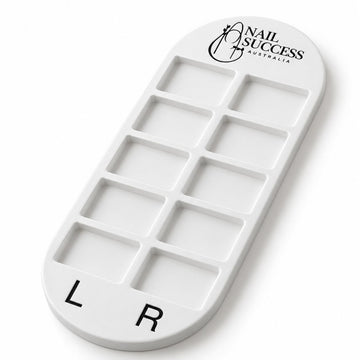 White Nail Success Australia nail tip organiser tray with 10 empty compartments, black logo and L/R markers.
