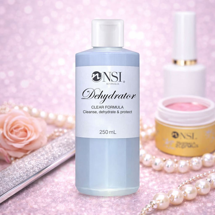 NSI Australia NailPure Plus Dehydrator 250mL nail prep solution bottle on pink beauty background