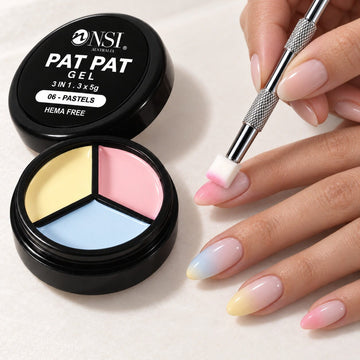 Pat Pat Gel Mini Palette with the claw tool and a cube sponge, patting pastel ombre onto almond nails