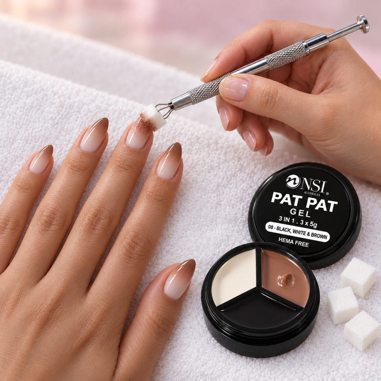Nail tech patting black, white and brown ombre onto a client's nails with the 3 Colour - 08 Black, White & Brown Pat Pat Gel and a cube sponge in the claw tool