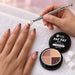 Nail tech using the 4 Colour - 01 Nudes & Browns Pat Pat Gel kit, patting nude and brown ombre onto a client's nails with a cube sponge in the claw tool