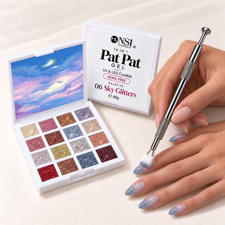 Pat Pat Gel Palette 16 colours, set 06 Sky Glitters, with the claw tool and a cube sponge patting blue glitter ombre onto almond nails