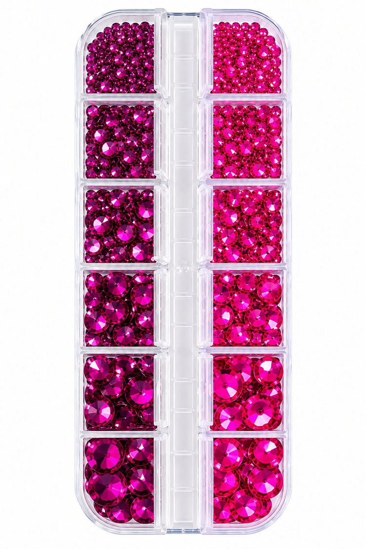 Pink rhinestones tray, 12 clear compartments sorted small to large, deep magenta left and hot pink right