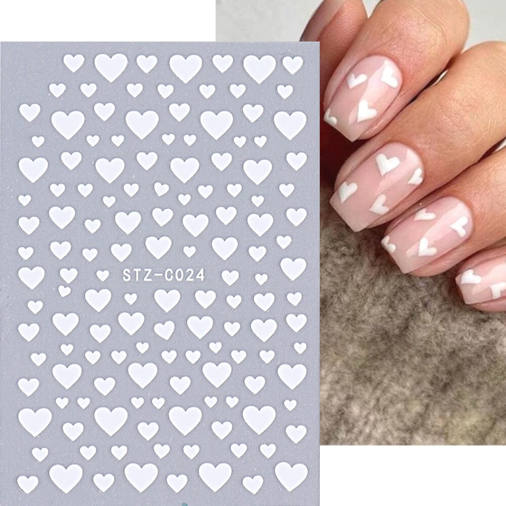 White hearts nail art stickers STZ-C024 with assorted sizes; sample nude pink manicure — NSI Australia