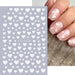 White hearts nail art stickers STZ-C024 with assorted sizes; sample nude pink manicure — NSI Australia