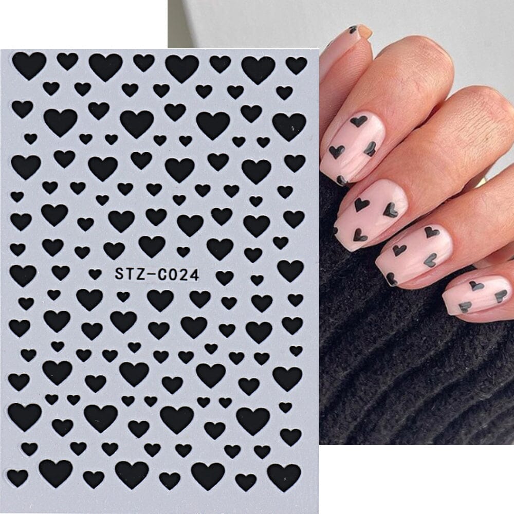 Black hearts nail art stickers STZ-C024; assorted sizes with sample nude pink manicure — NSI Australia