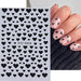 Black hearts nail art stickers STZ-C024; assorted sizes with sample nude pink manicure — NSI Australia