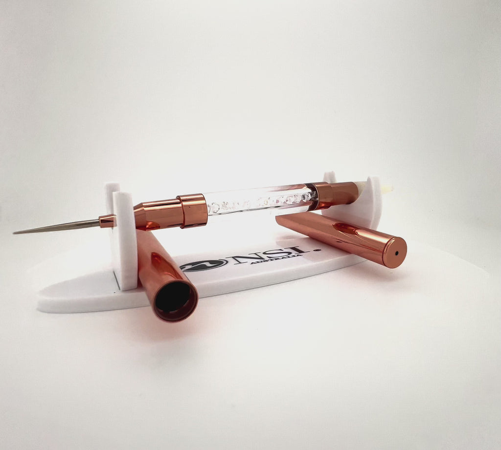 NSI Australia double-ended nail brush 05 — rose-gold with crystal handle, white silicone sculpting tip + ultra-fine liner, includes protective caps