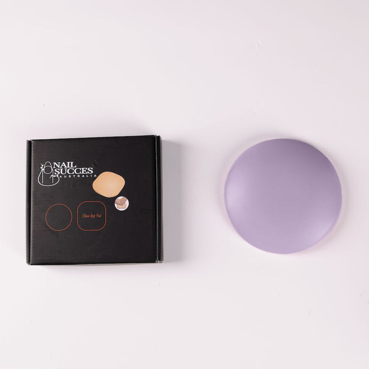 NSI Australia Pro Elbow Pad — purple round manicure arm rest cushion shown with retail box