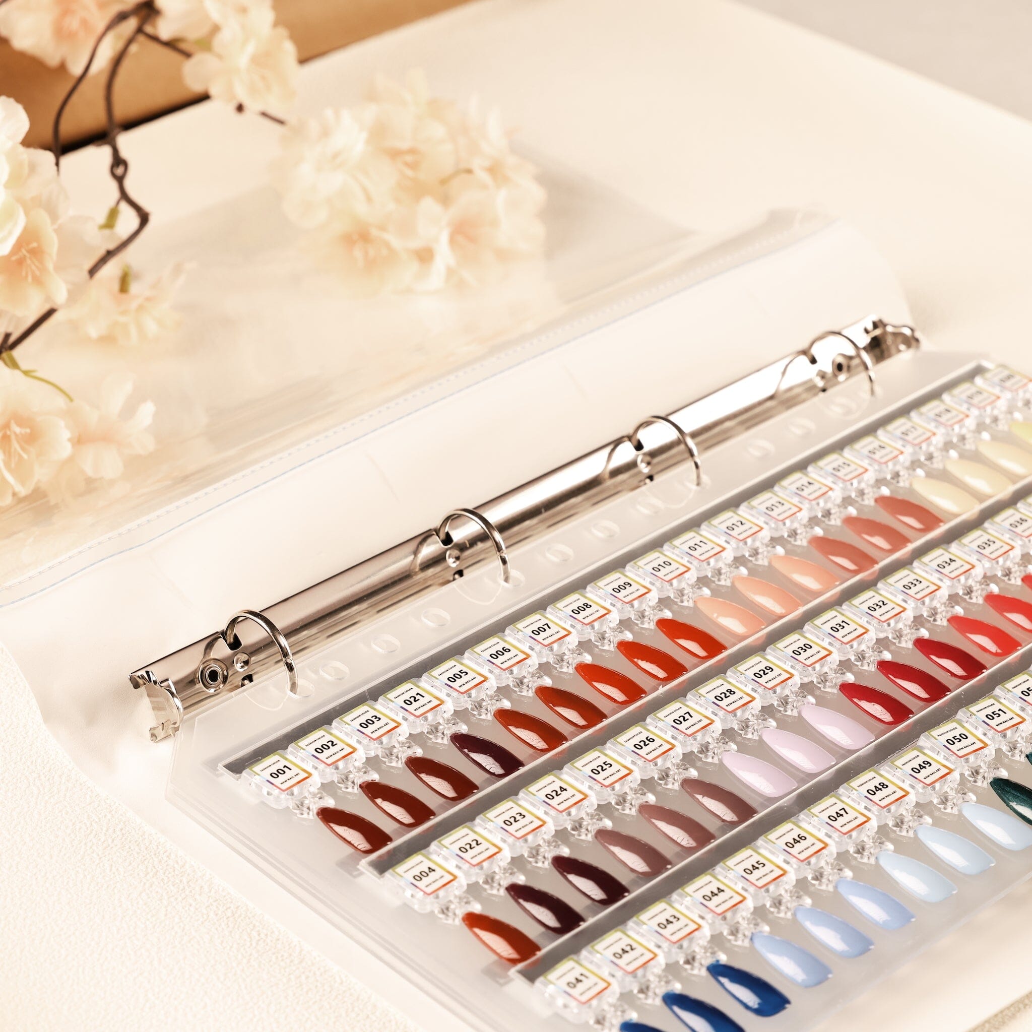 NSI Australia Pro Magnetic Swatch Colour Display Book — close-up of ring binder with numbered gel polish nail tip samples