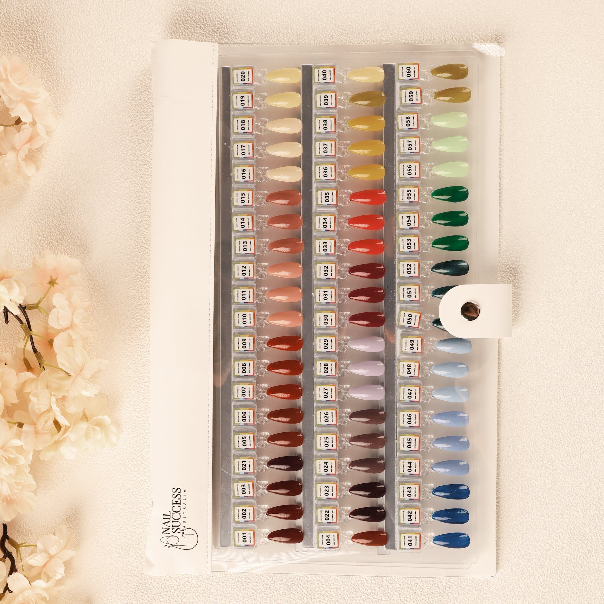NSI Australia Pro Magnetic Swatch Colour Display Book — open gel polish colour chart with labeled nail tip swatches and snap closure