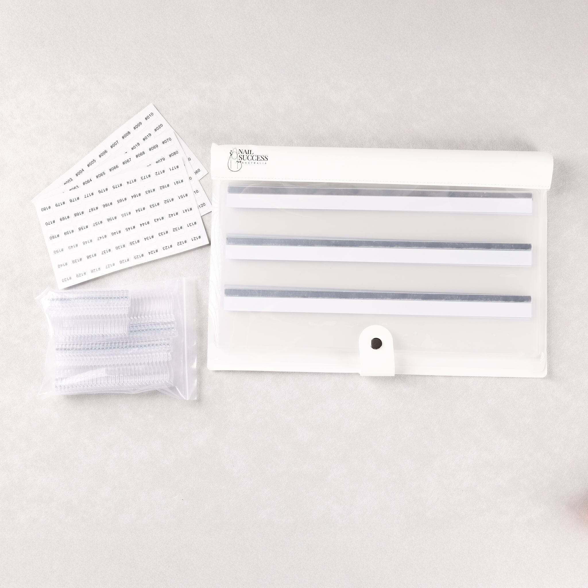 NSI Australia Pro Magnetic Swatch Colour Display Book for gel polish with magnetic strips, swatch sticks, and label stickers in a clear pouch