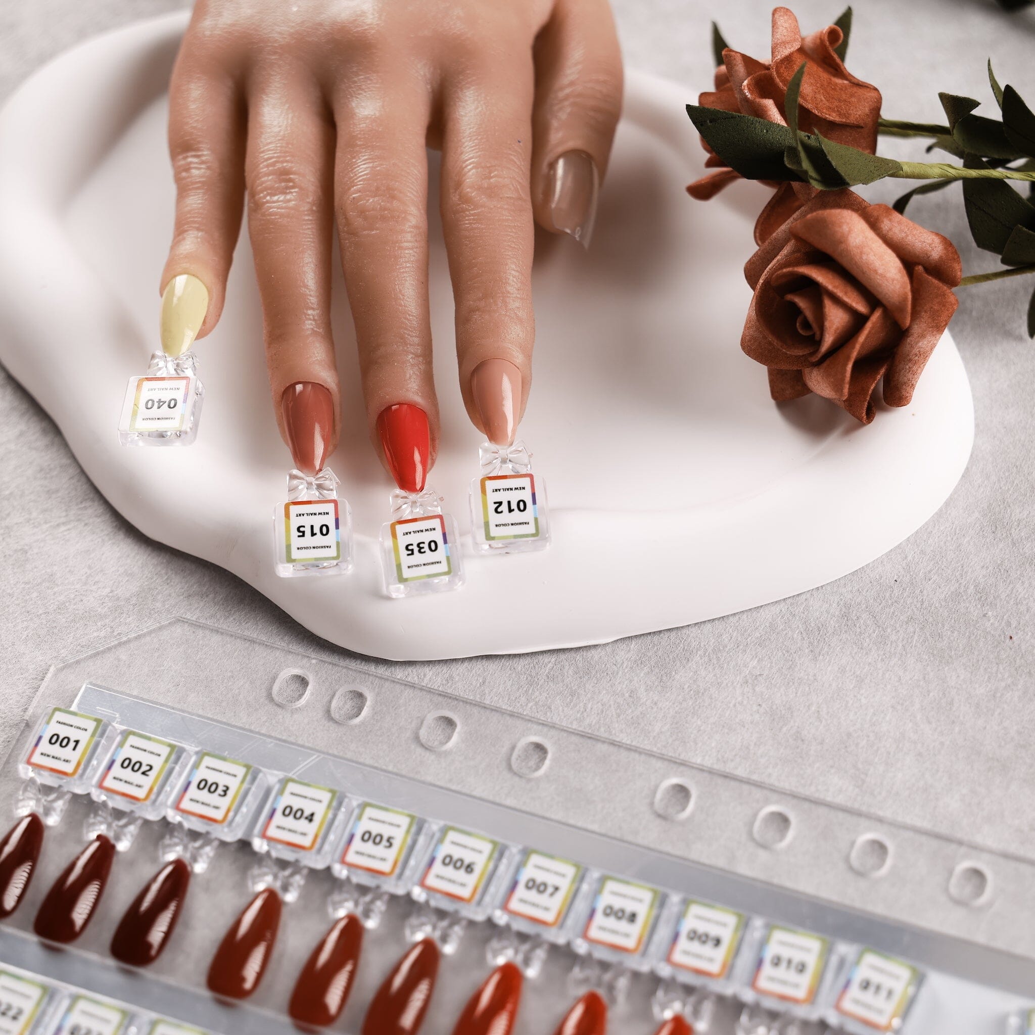 NSI Australia Pro Magnetic Swatch Colour Display Book — mannequin hand testing magnetic, numbered gel polish swatch tips with colour chart page visible