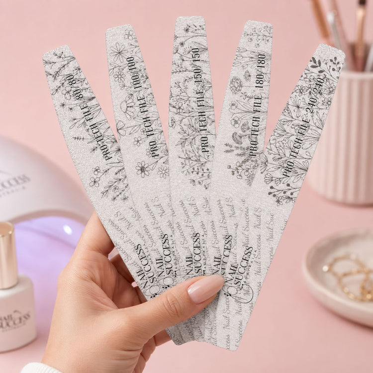 240 for acrylic, gel and salon nail shaping held on pink manicure table