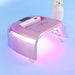 UV nail lamp with flash cure torch on top for curing gel nails.
