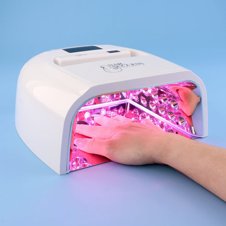 UV nail lamp in white, hand curing gel nails under LED lights