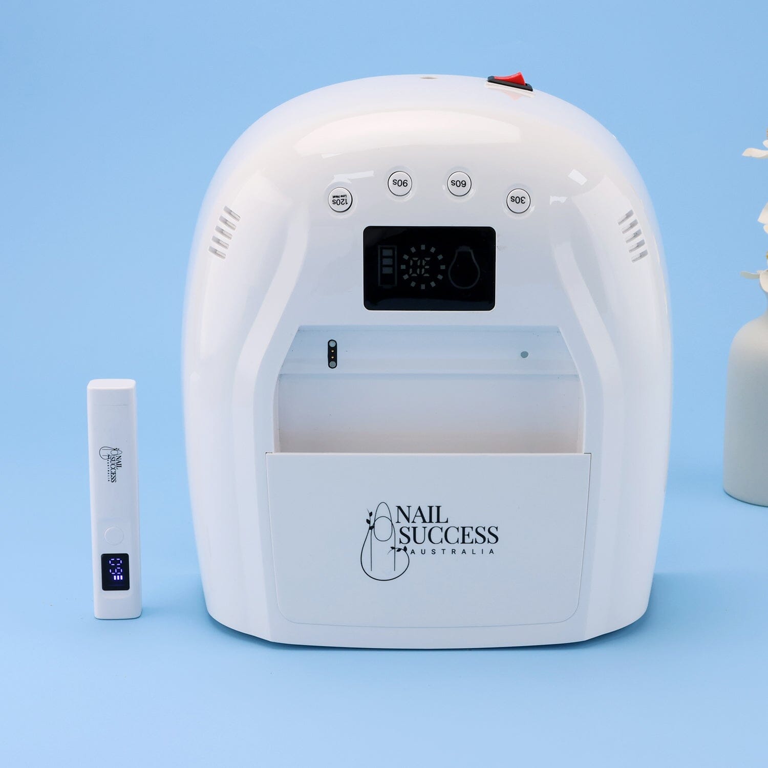 UV nail lamp with matching white flash cure torch for professional gel nails.