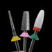 Nail drill bits fitted with mixed colour dust protector caps, shown on diamond, carbide and ceramic e-file bits to help protect manicure drill handpieces