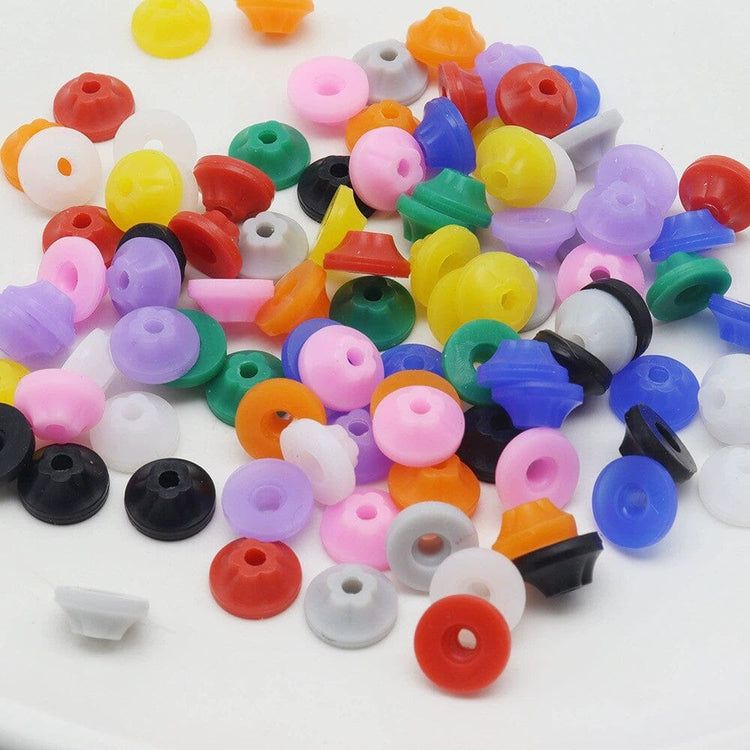 Mixed colour nail drill bit dust protector caps in assorted shades for e-file bits, helping reduce dust entry and protect manicure drill handpieces