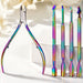 Rainbow nail tool set with cuticle nipper and four stainless steel manicure tools on display block