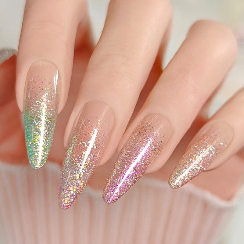 Born Pretty reflective glitter gel polish on long almond nails with nude base and sparkling ombre tips