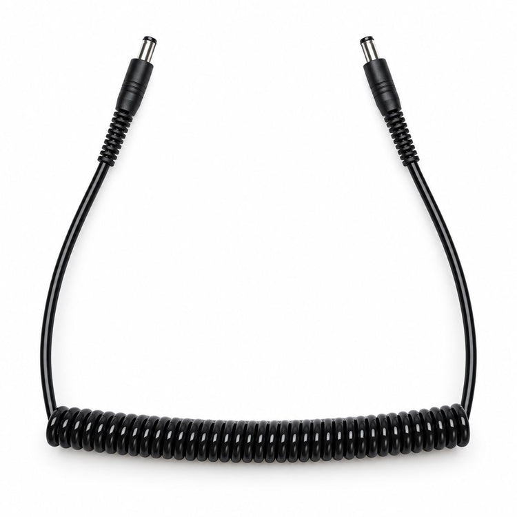 Black coiled replacement handpiece cord for a portable nail drill, with barrel connectors at both ends on a white background.
