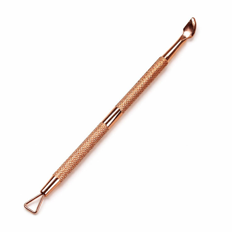 Rose gold double-ended cuticle care tool with spoon-shaped pusher, triangle loop scraper and textured grip handle