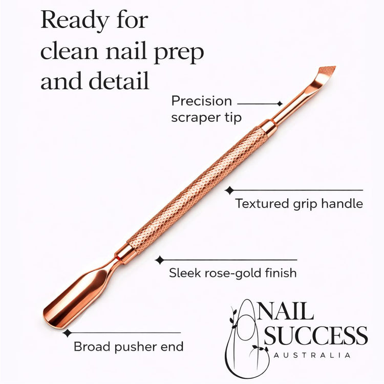 Nail Success Australia rose gold cuticle pusher and scraper tool with textured grip handle, broad pusher end and precision scraper tip