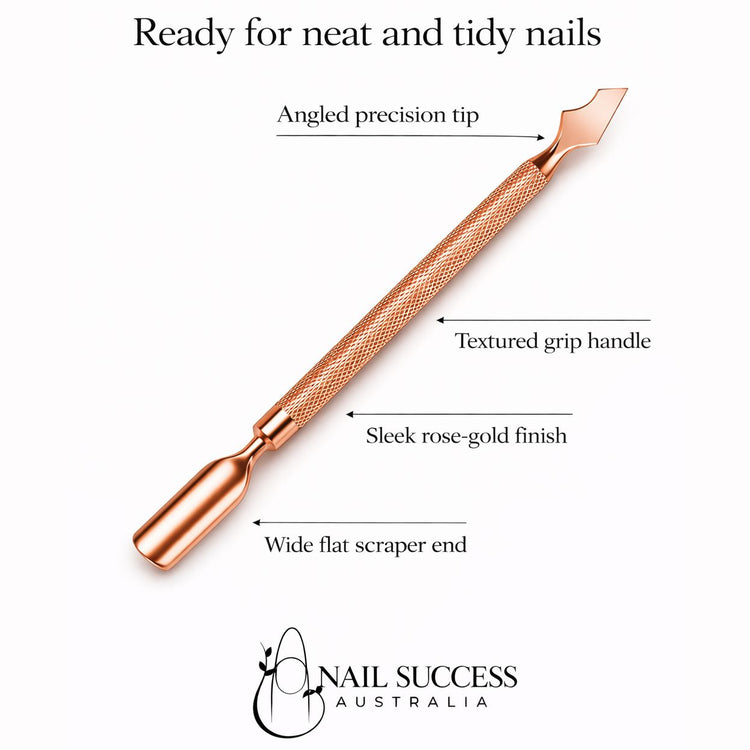 Nail Success Australia rose gold cuticle pusher and angled precision scraper tool with textured grip handle and wide flat scraper end