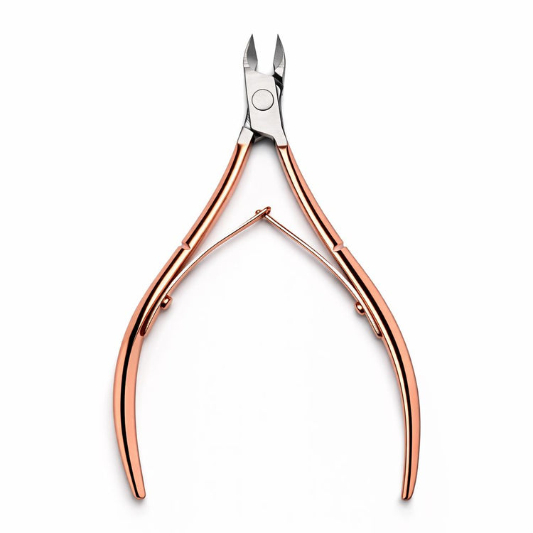 Rose gold cuticle nipper with stainless steel blades on light grey background