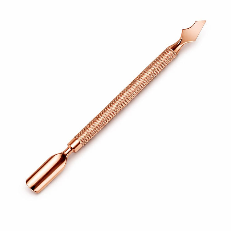 Rose gold double-ended cuticle pusher and angled precision scraper nail tool with textured grip handle