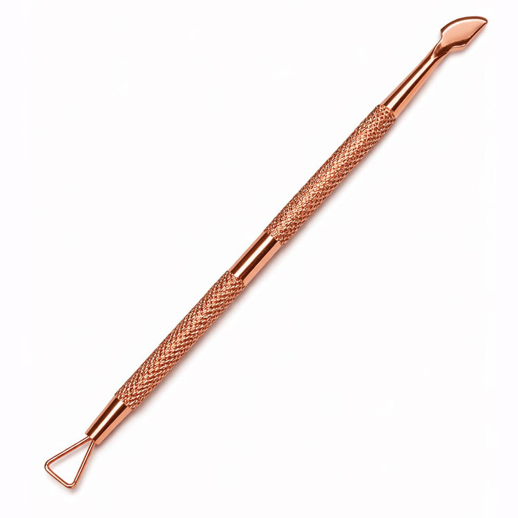Rose gold double-ended cuticle care tool with angled precision scraper tip, triangle loop scraper and textured grip handle