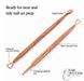 Rose gold nail art tool set with angled pusher, triangular loop-end detailer and fine ball-tip detailing tool
