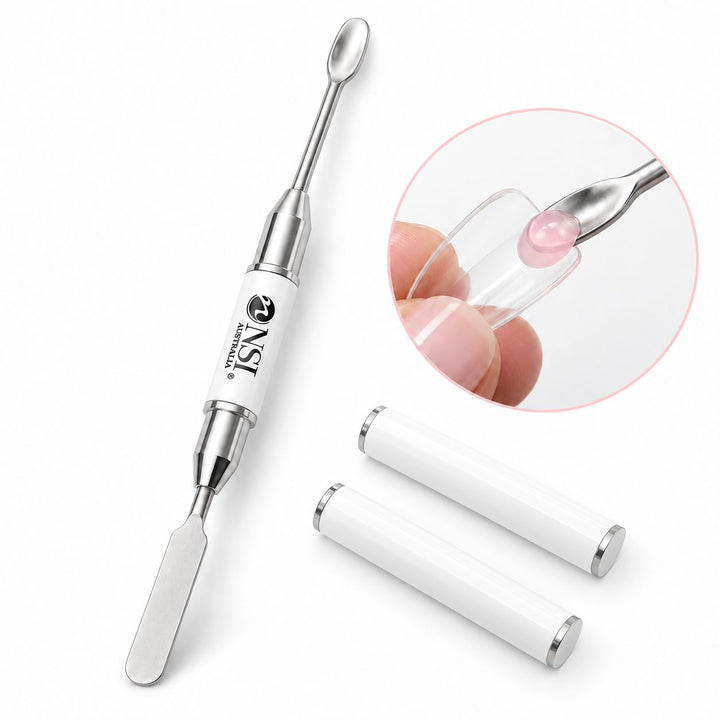 White NSI double-ended gel scooping wand and spatula with two protective caps, shown placing pink gel into a clear nail form.