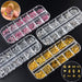 Shaped nail rhinestones & metal studs — silver, gold and pink 12-grid trays with assorted charms and example nail art — NSI Australia