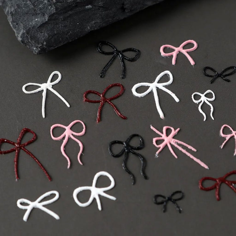 Nail Success Australia 3D bow nail art charms in pink, white, black and burgundy