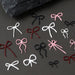 Nail Success Australia 3D bow nail art charms in pink, white, black and burgundy
