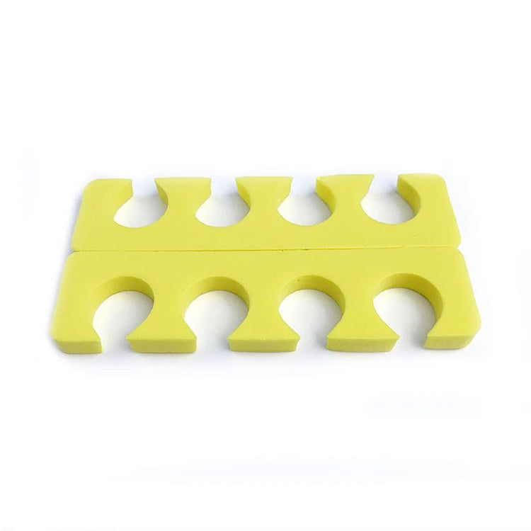 Yellow foam toe separators — pedicure spacers for nail polish