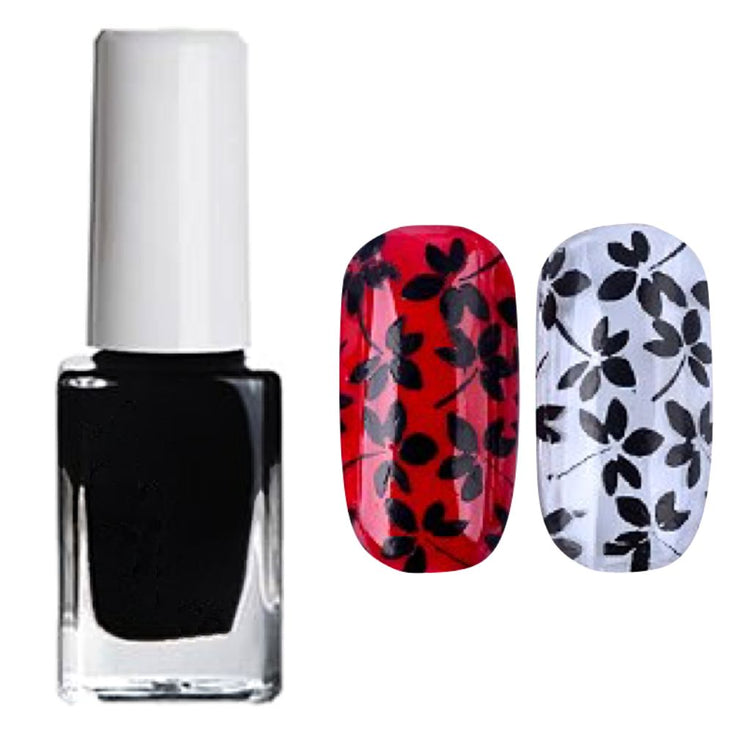 Black nail art stamping polish with white cap, shown with black floral stamped designs on red and silver nail tips for detailed manicure art