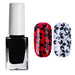 Black nail art stamping polish with white cap, shown with black floral stamped designs on red and silver nail tips for detailed manicure art