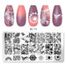 Nail stamping plate set shown with five sample nail tips above and the metal stamping plate below. The sample nails feature floral and abstract designs in white over pink-to-purple gradients, and the plate displays multiple black floral and decorative stamp motifs.