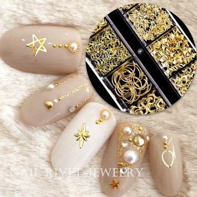 Gold stars and moon nail art charms with pearl accents on nude manicure design samples