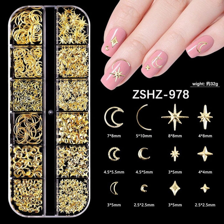 Gold stars and moon nail art charms set with celestial designs and pink manicure sample
