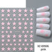 Light Pink Star Nail Art Sticker XZ-D9506 sheet with pastel pink star designs and white manicure samples