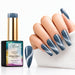 Nail Success Steel Meteor 09 cat eye gel polish with matching swatch and slate blue coffin nails featuring silver shimmer bands.
