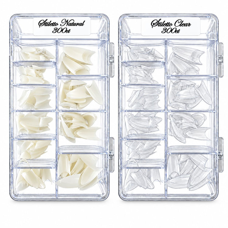Natural-coloured and clear stiletto nail tips in transparent storage trays, each containing 300 tips in assorted sizes.
